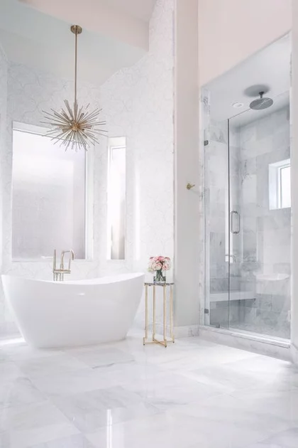 White colored bathroom with a bathtub